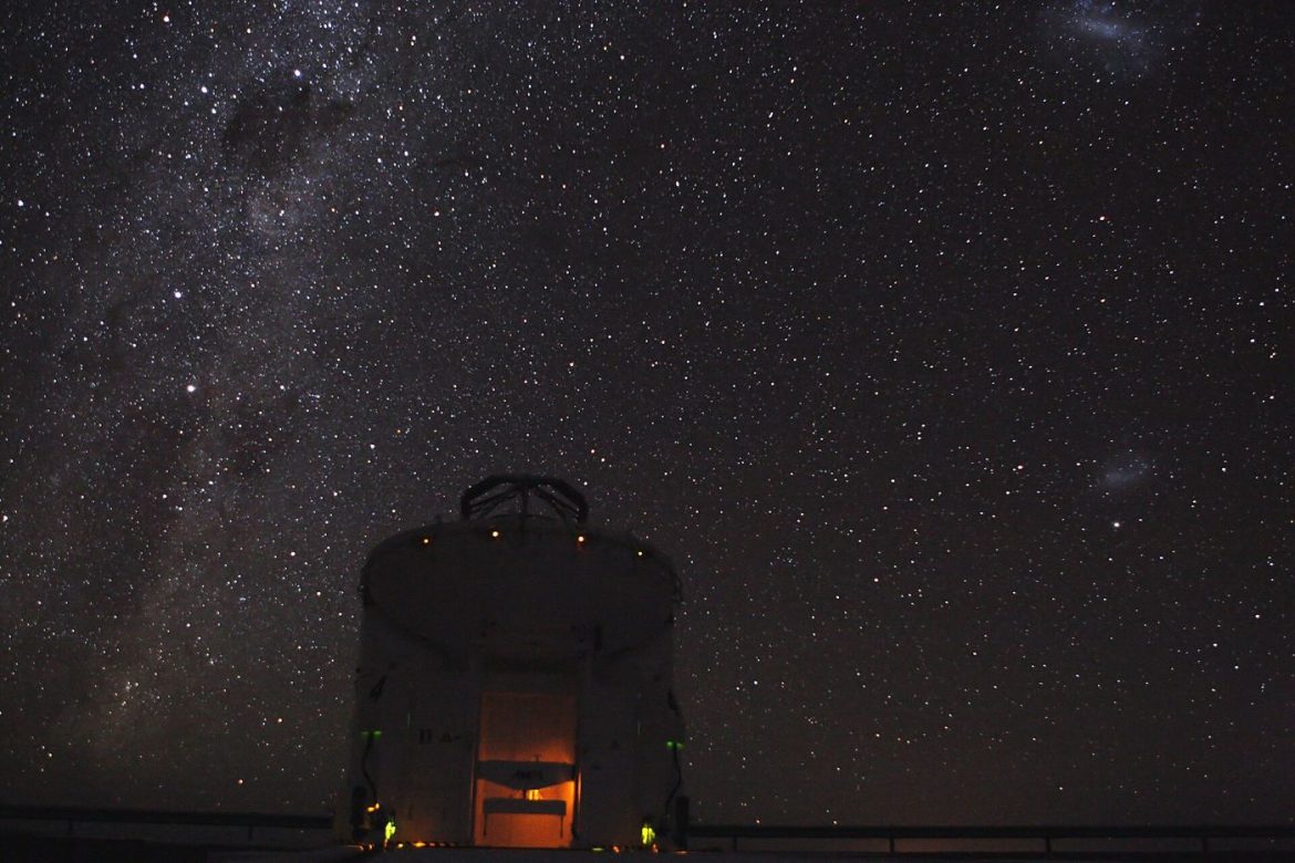 A telescope under a starry sky